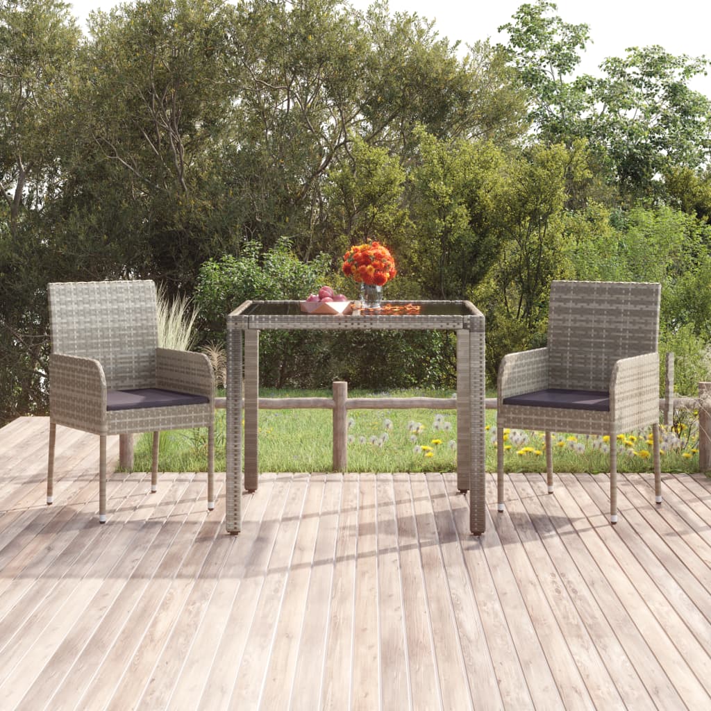 vidaXL Mesa de jardín superficie de vidrio ratán PE gris 90x90x75 cm