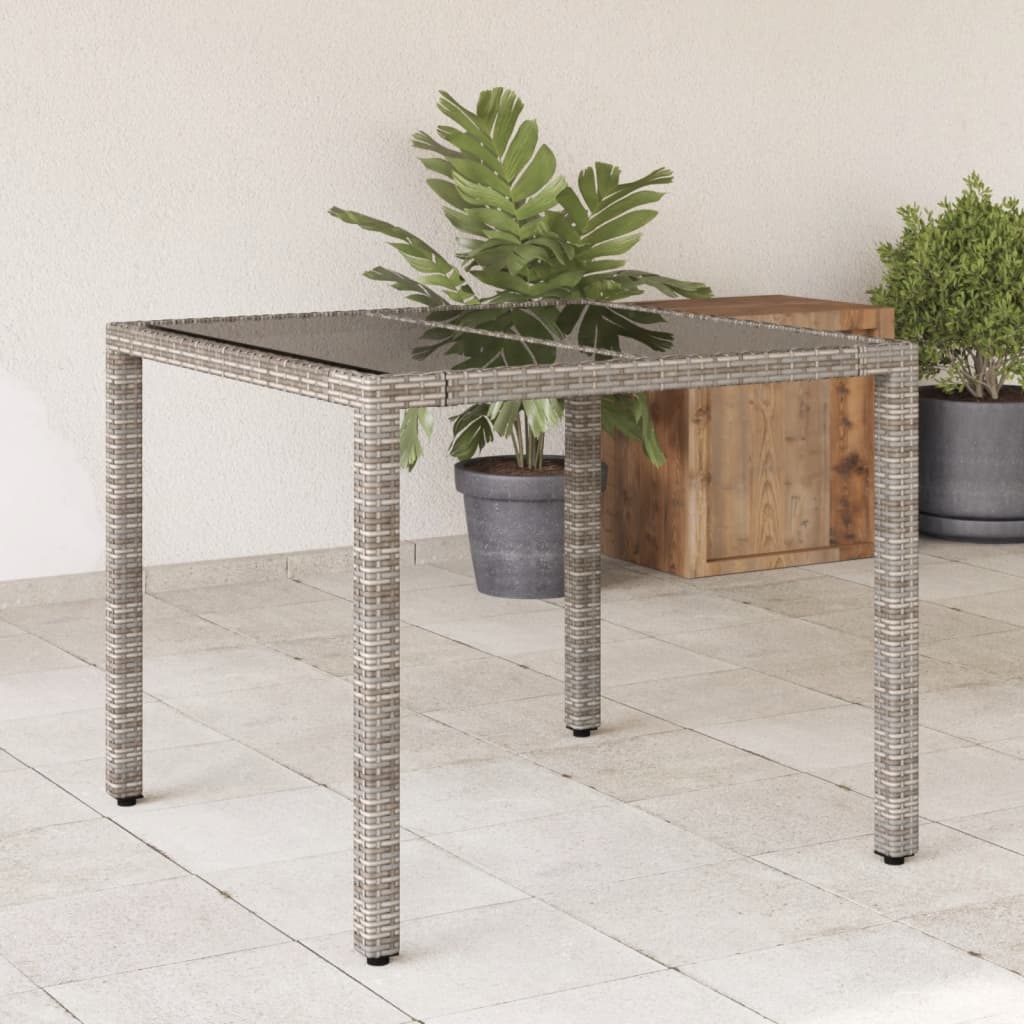 vidaXL Mesa de jardín superficie de vidrio ratán PE gris 90x90x75 cm