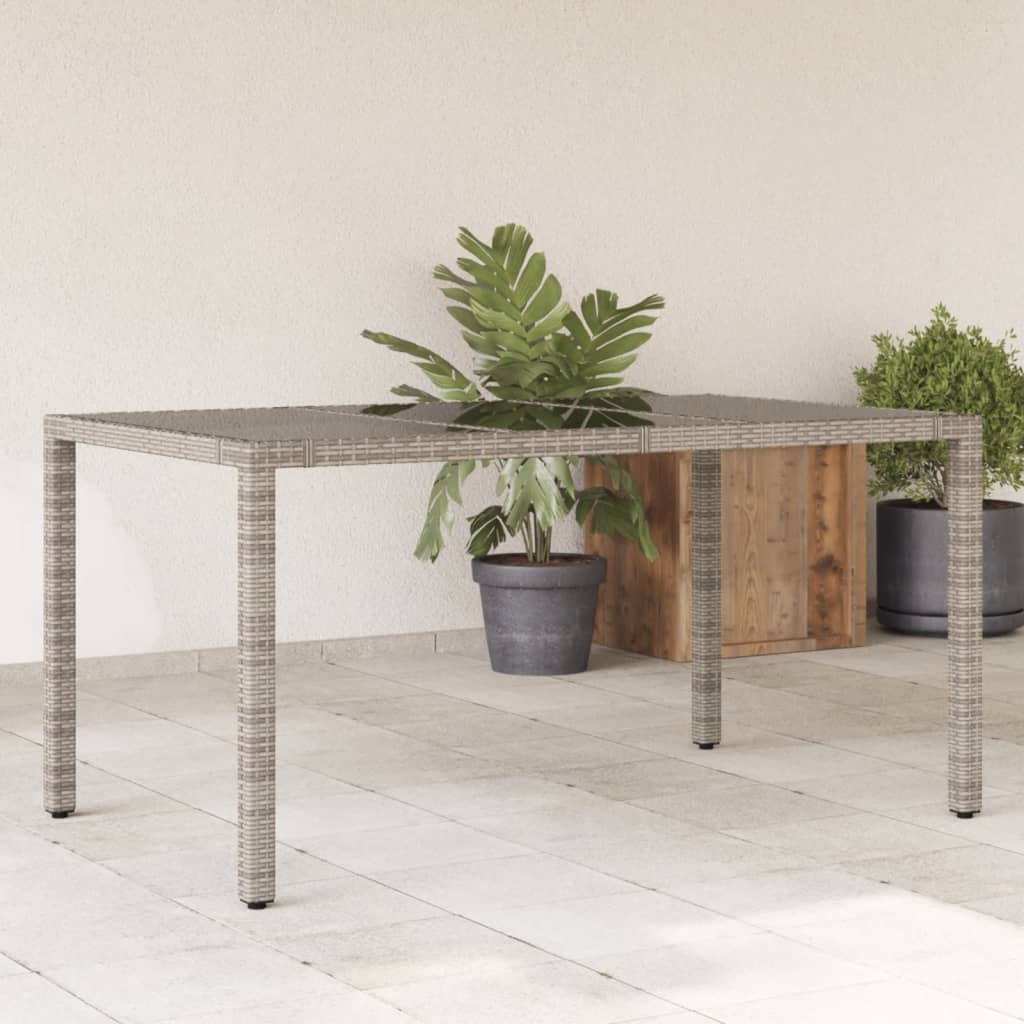 vidaXL Mesa de jardín superficie de vidrio ratán PE gris 150x90x75 cm